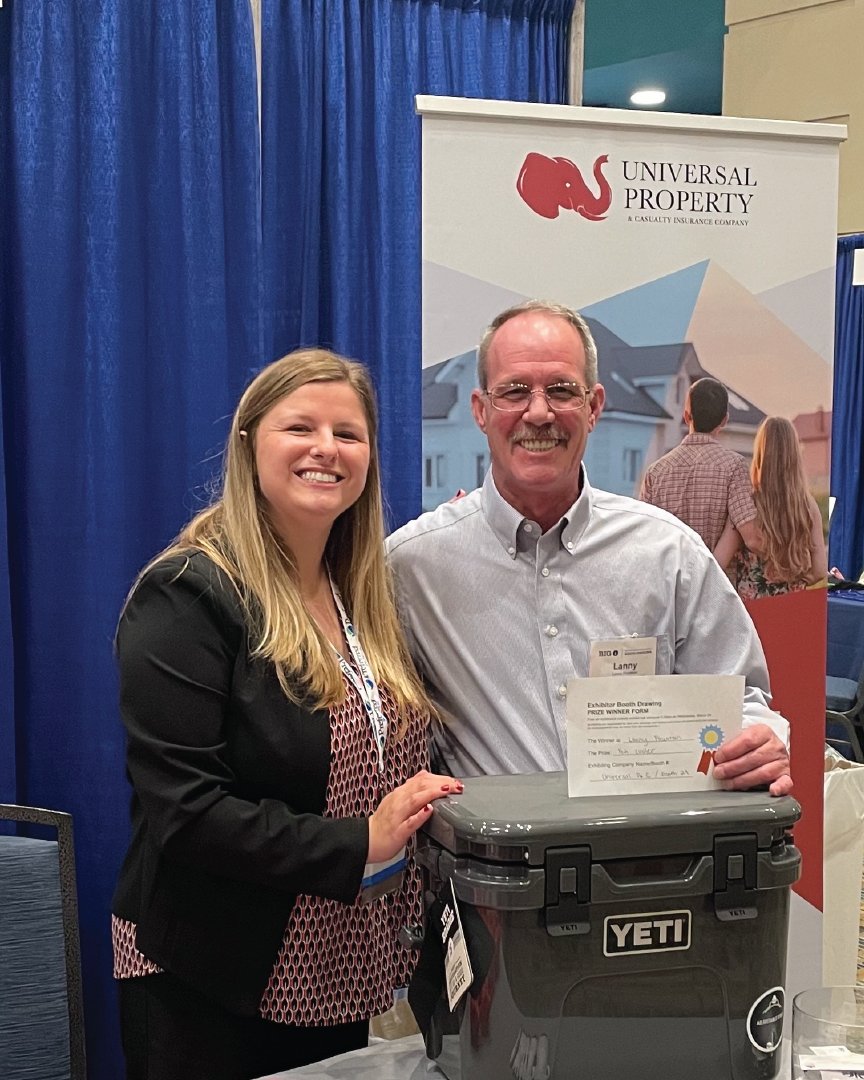 From 3/26-27, UPCIC was represented at the <a href="/IIABSC/">IIABSC</a> spring conference in Columbia, SC. Attendees enjoyed speeches, networking, and a trade booth exhibition. UPCIC Marketing Representative Kate Barton is pictured with Yeti cooler winner Lanny Fountain with R.A. Wright Agency.