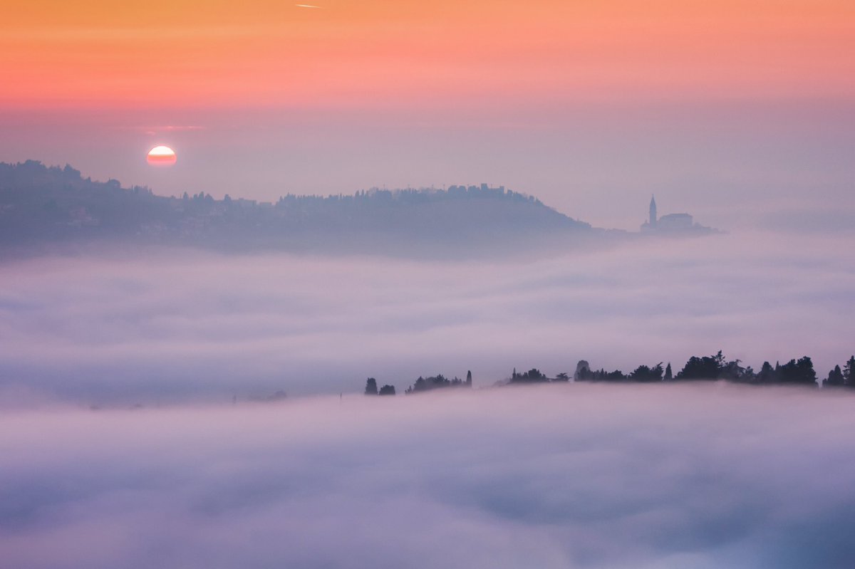 Rare fog on the Slovenian coast, with Piran peeking out of the clouds. #slovenia #fog #piran #istria #sunset #landscape #nature