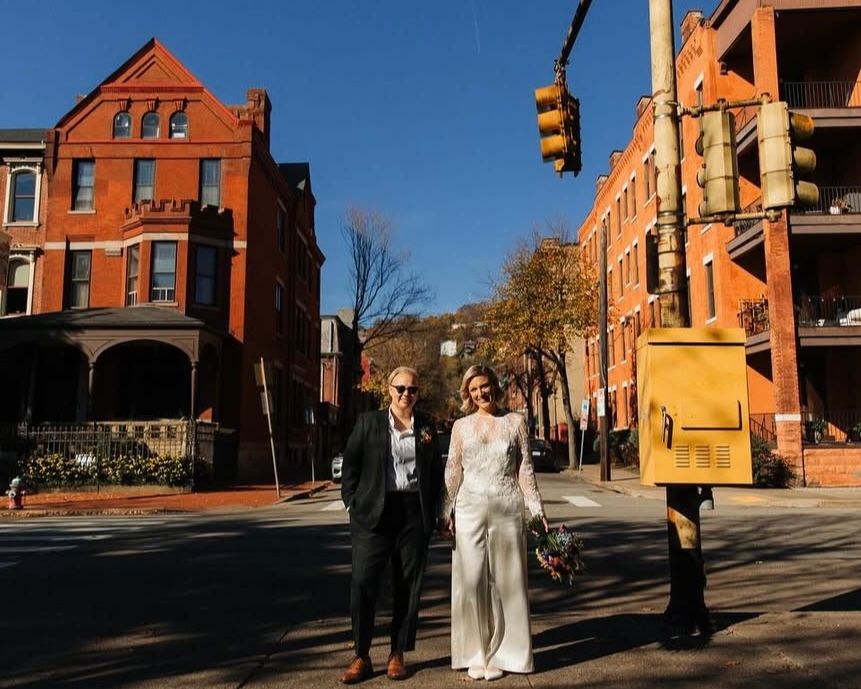When Katie and Amy first stepped into The Tailory New York, she knew she wanted something different - and the moment we laid out our signature white silk satin and delicate lace, magic happened.

Together, we crafted a piece that redefined bridal wear: a bespoke jumpsuit with