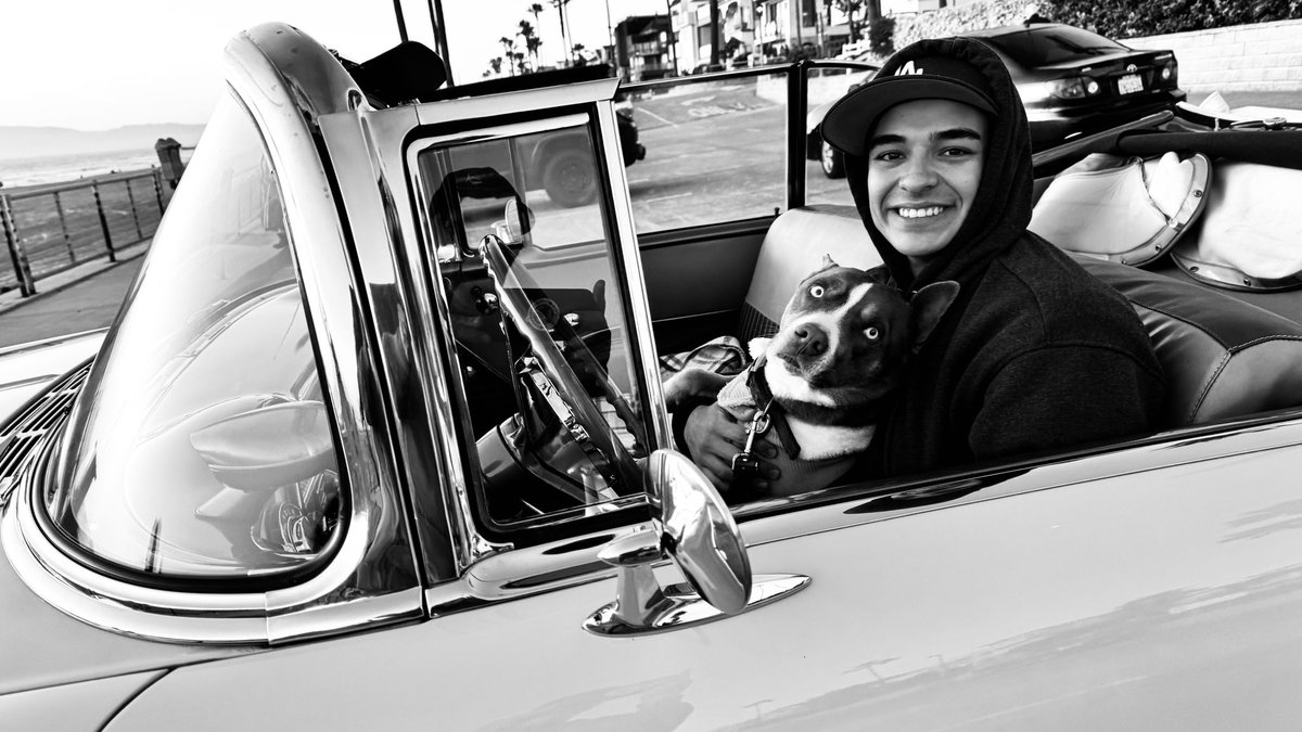 “Early morning beach runs with my vintage ride and trusty pup. Nothing beats the rumble of classic chrome, salty air, and four paws hanging out the passenger window. #ClassicCarLife"