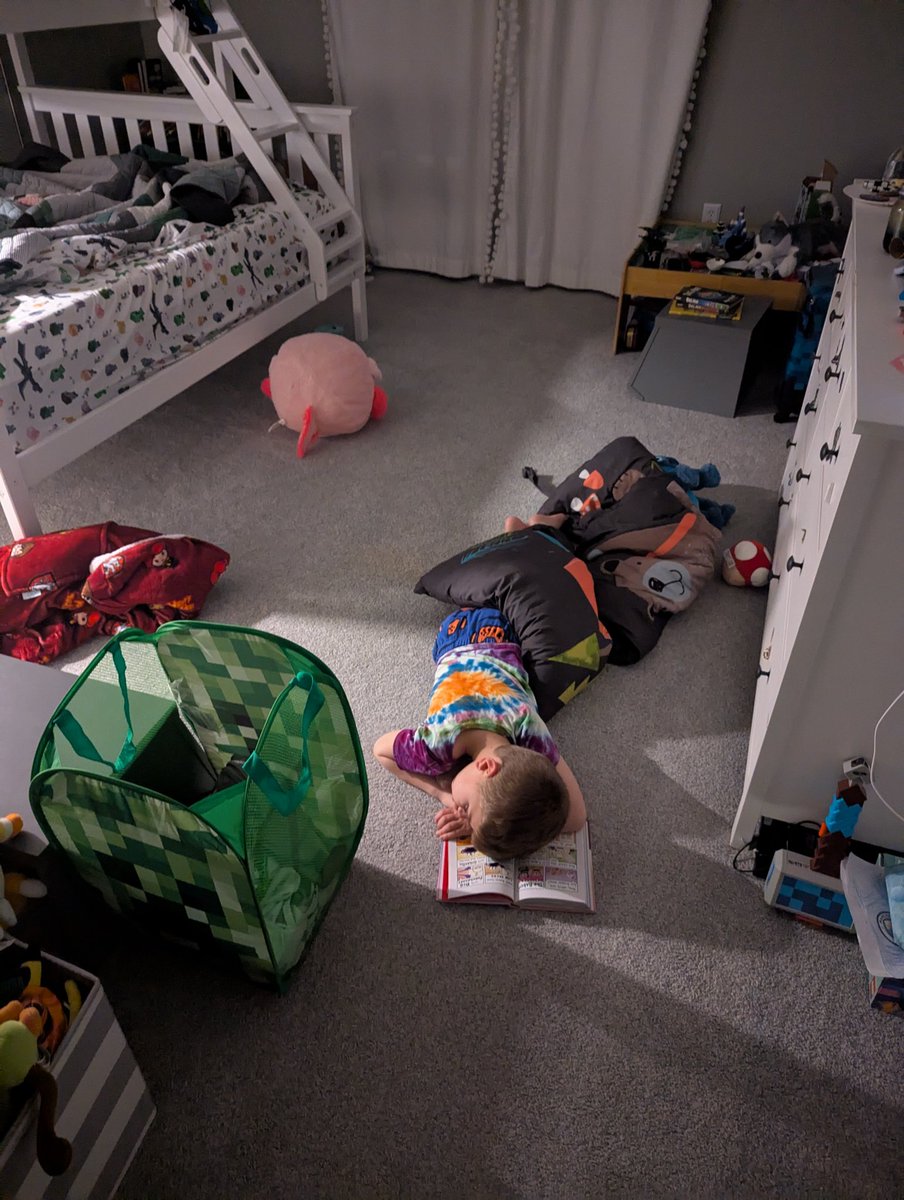 Falling asleep on the floor in your big brother's room, while enjoying a book from your favorite series. #SweetDreams