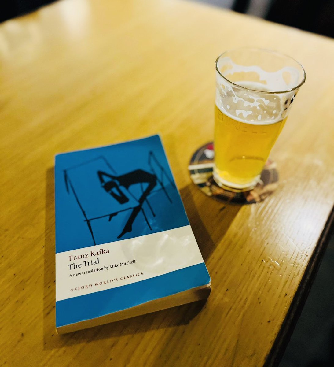 DrDavidVernon's tweet photo. High above Prague, reading bits of The Trial for the umpteenth time. I never tire of returning to Kafka’s work — it is endlessly engaging, always provoking us to find new meanings. Na Zdraví! https://t.co/ZU5iMRsogT