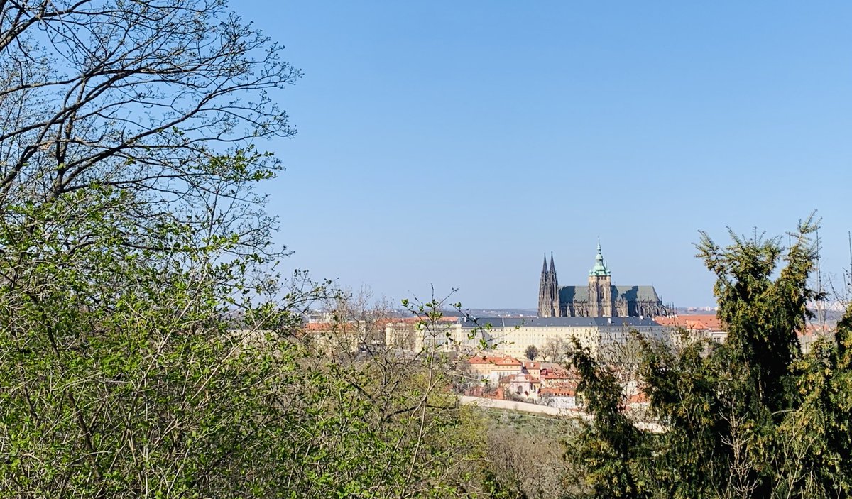 DrDavidVernon's tweet photo. High above Prague, reading bits of The Trial for the umpteenth time. I never tire of returning to Kafka’s work — it is endlessly engaging, always provoking us to find new meanings. Na Zdraví! https://t.co/ZU5iMRsogT