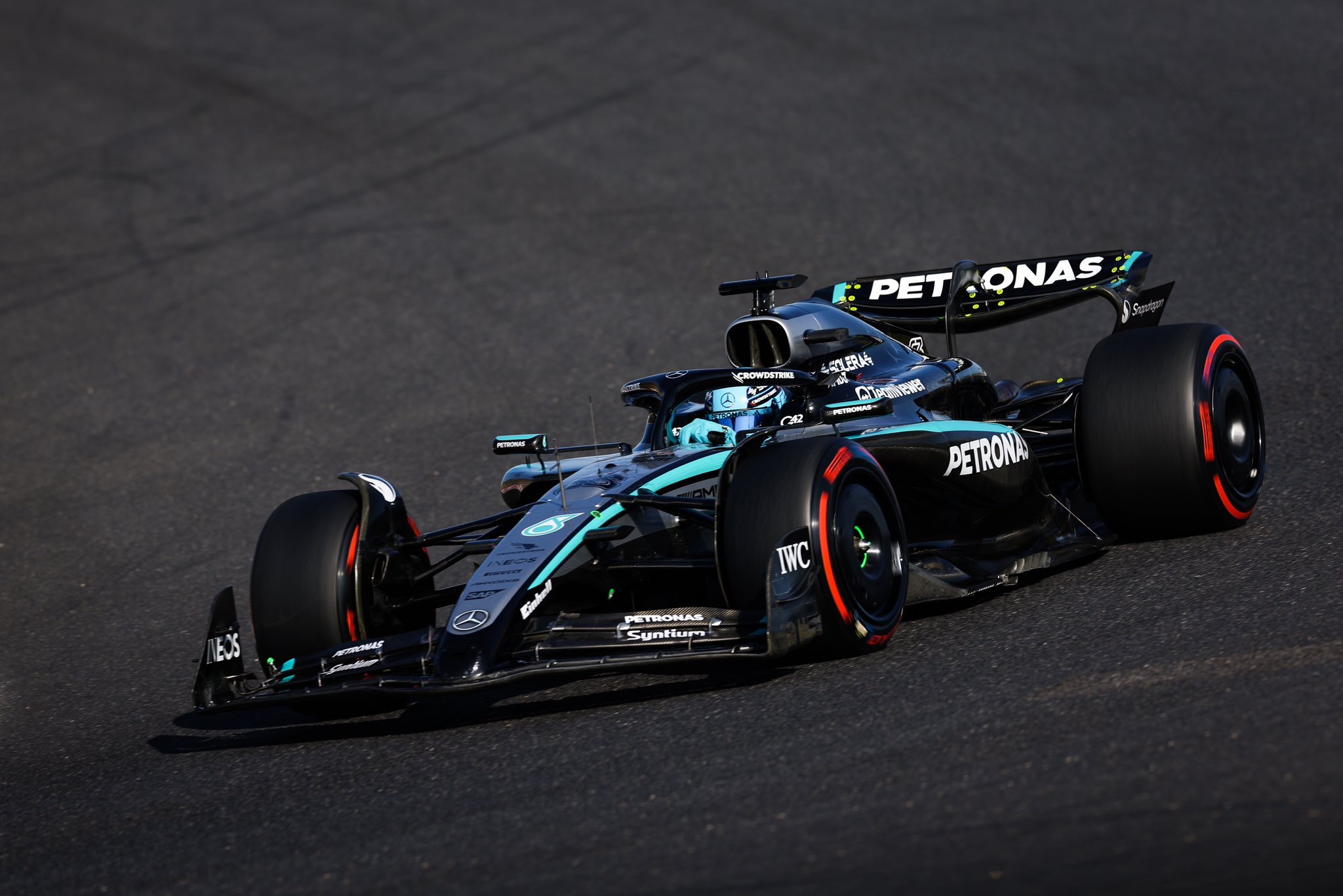 George Russell drives his W16 around the Suzuka track