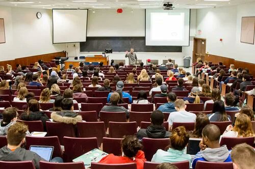 Is this a dying business?

College. 

Astronomical prices keeping learners in decades of debt.
Bloated administration.
Underpaid professors.
Large lecture halls with 90% of students are browsing the internet. 
No guarantee of employment upon graduation. 
Less companies requiring
