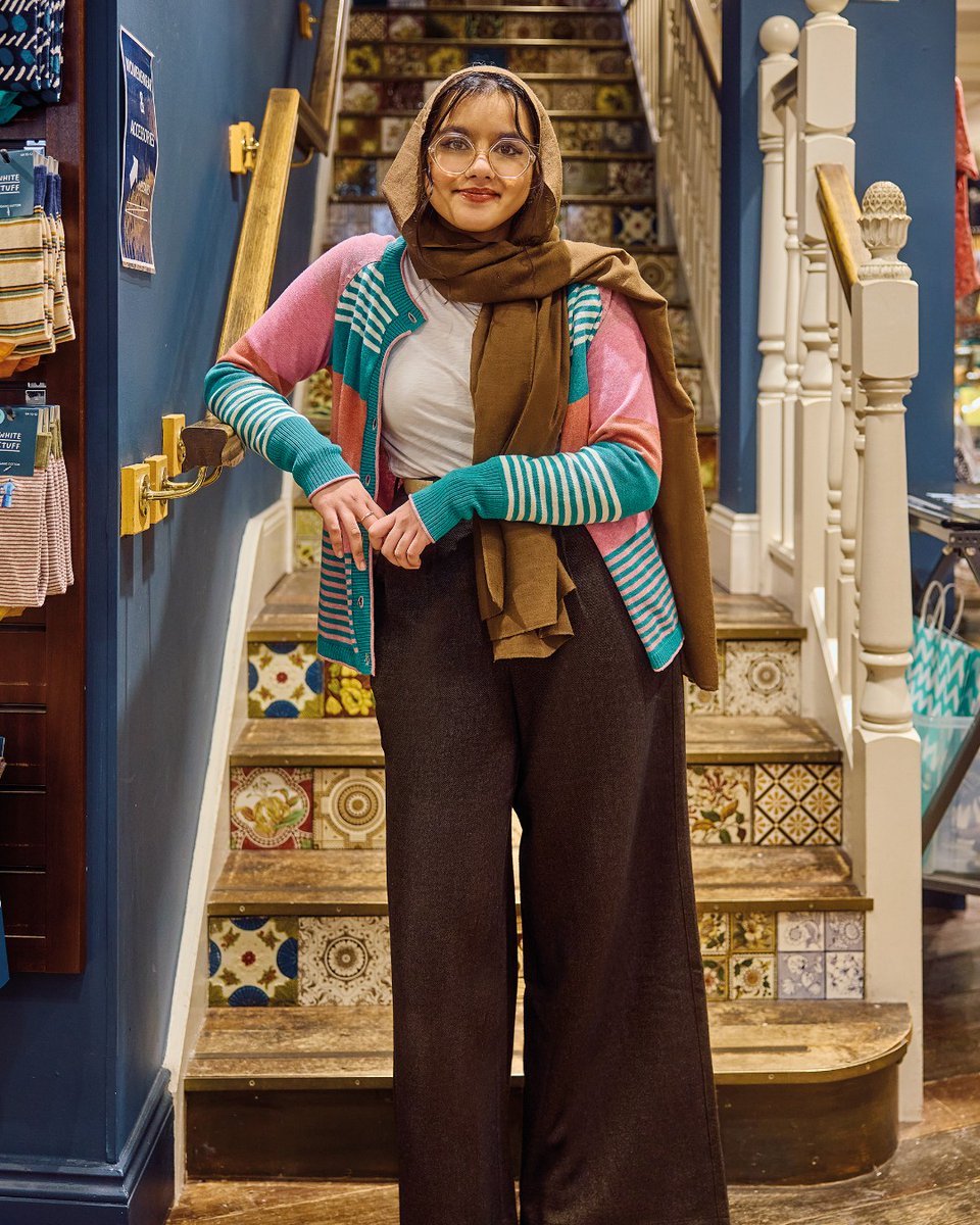 Team picks: meet Mahira from our York Shop. ​

​"I'm wearing the Sasha wide leg trousers. I love these because they're fancy, but not totally fancy. You can dress them up or down. And I'm wearing the Clara tee because it's a good basic with the Lulu cardi for a pop of color."