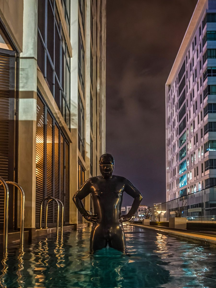 RUBBER REAPER 01

Midnight cloaked the hotel in stillness, broken only by the soft lap of water as the rubber gimp lowered himself into the pool. His suit clung tight, heavy with each step, dragging slightly as he waded deeper. 
📸 <a href="/saint803/">saint80</a> 
🧥 <a href="/Mrlatex2020/">胶胶者</a>
