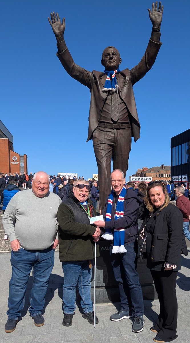 All smiles, (before today's match!) at Ibrox, as John, Campbell &amp; Nicola, from Kingdom True Blues Supporters' Club, present Peter, from <a href="/RangersFC/">Rangers Football Club</a> Blind Party with a generous donation to kick-start our fundraising as we aim to upgrade our #ADcommentary equipment.
Many thanks! 😁