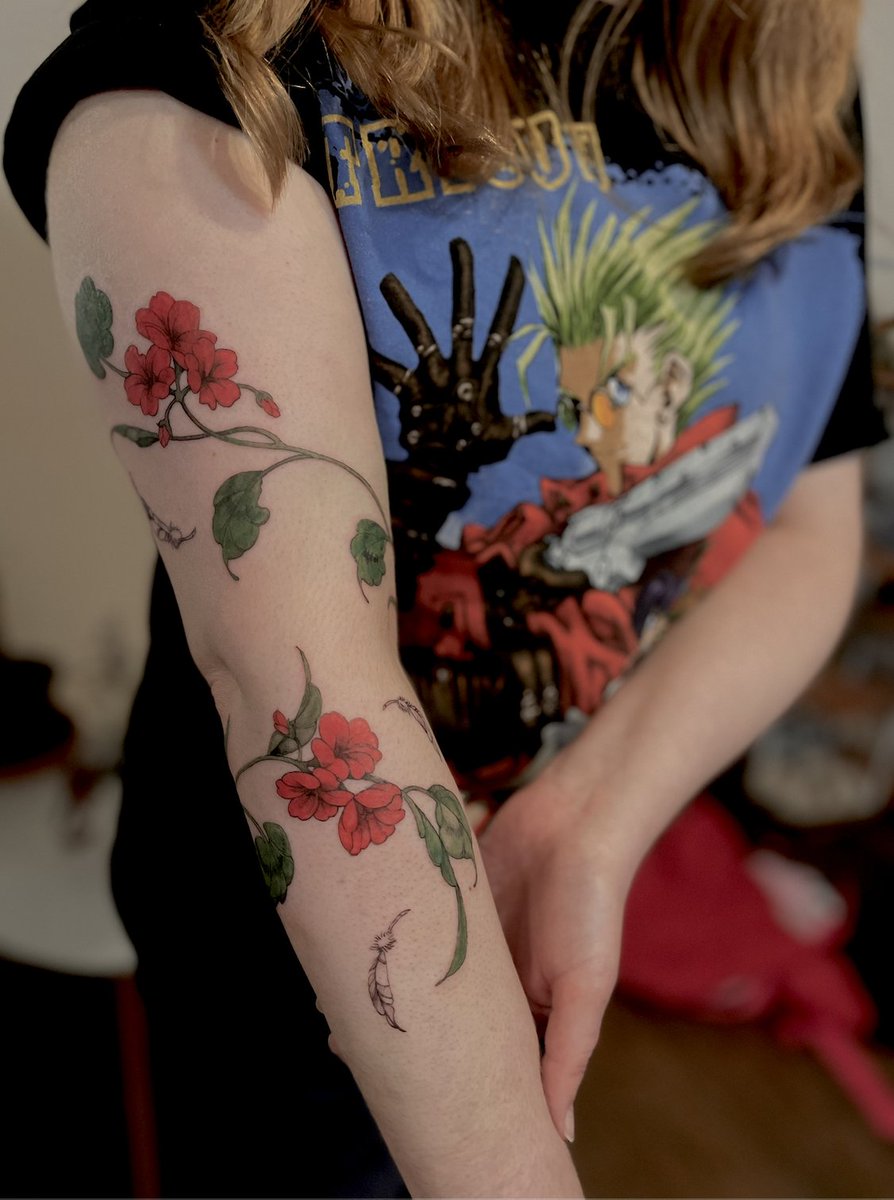 "In the language of flowers, geranium means 'determination." 🥀

"Communication, connection, resonance" 🪶

Thank you *so much* <a href="/shesdeny/">Deny</a> for my Trigun tattoo. I'll treasure it always. ❤️