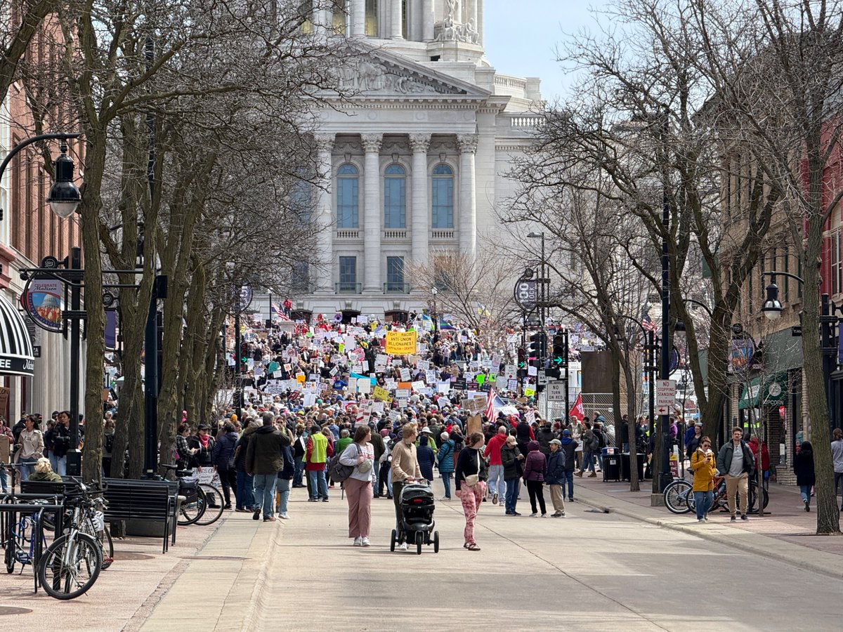 LiamPBeran's tweet image. In Madison, WI, turnout at today’s “Hands Off” protest is stretching into State Street and taking up the entirety of this corner of Capitol Square.