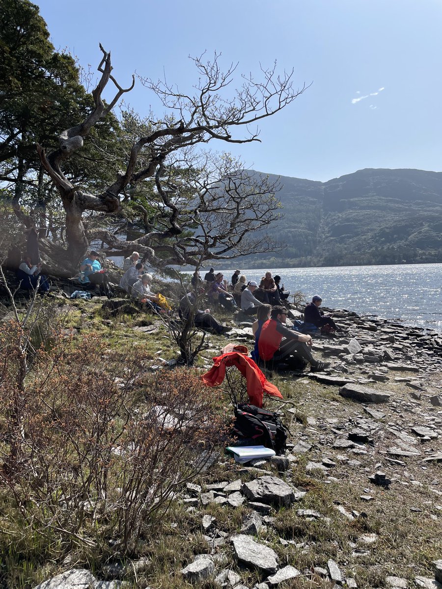 Lunch stop in the sun, at the Devonian-Carboniferous boundary, Middle Lake, Killarney, looking across at Torc Mountain. Thanks to leader Dr. Aidan Forde. ⁦<a href="/uccBEES/">Biological, Earth & Environmental Sciences, UCC</a>⁩ ⁦<a href="/GeolSurvIE/">Geological Survey IE</a>⁩
