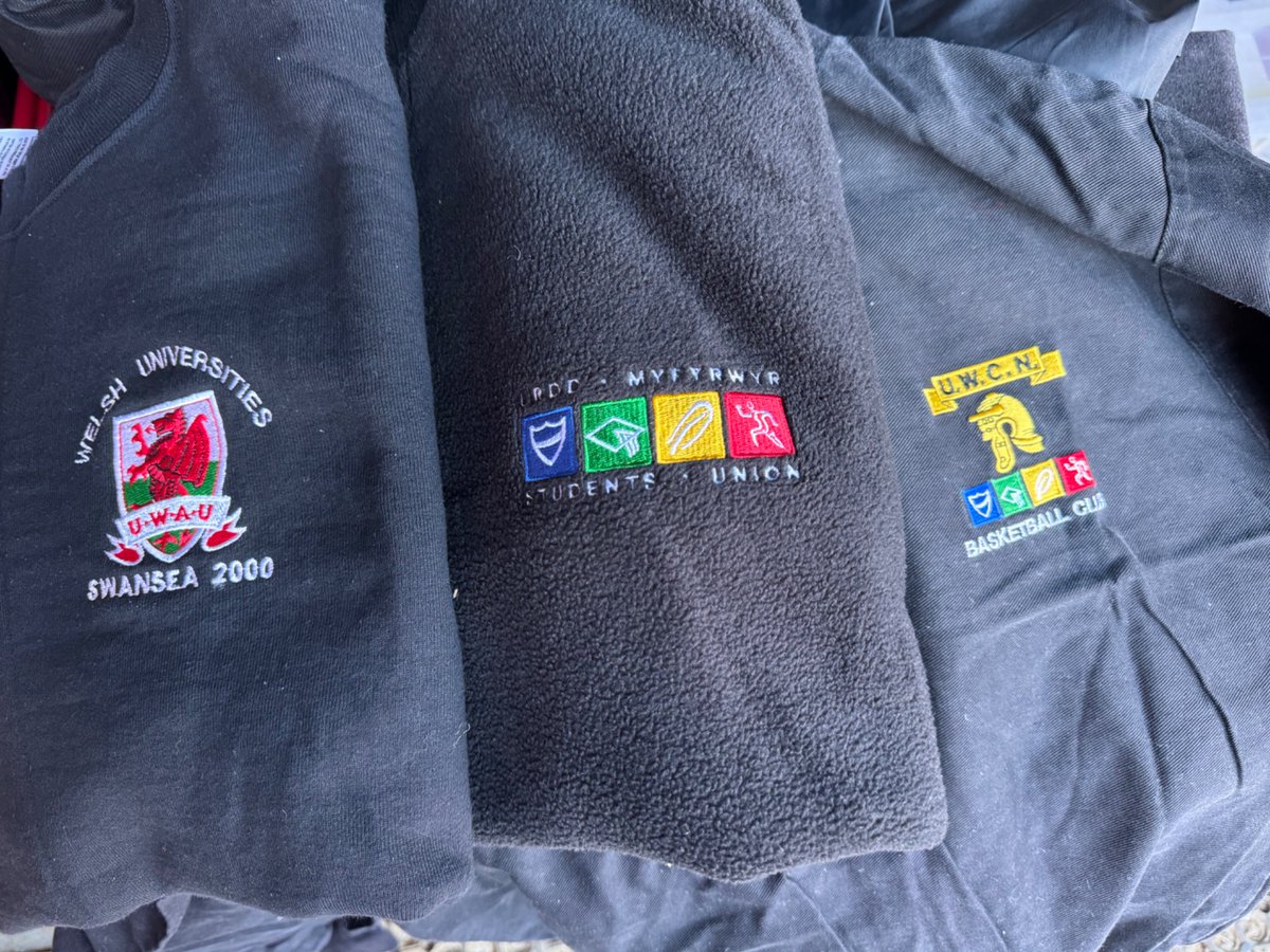 The garage clean out has uncovered more nostalgia.
My old #WelshUniversities officer jumper and MASSIVE rain jacket, my branded Students’ Union officer jumper &amp; my #UWCN <a href="/UniSouthWales/">University of South Wales</a> Basketball club training top, all embroidered by PSM sportswear as always!
#UniDays #oldtimes