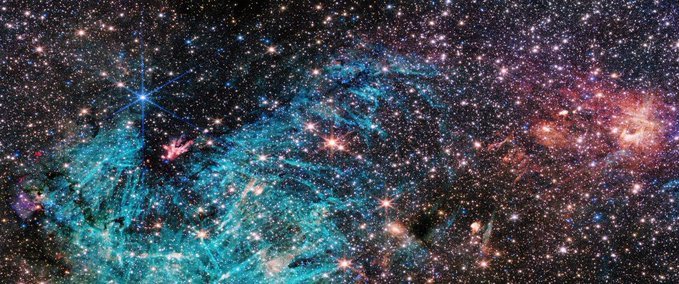 konstructivizm's tweet photo. The Sagittarius C region, a region about 50 light-years across near the center of the Milky Way, is captured by James Webb. The image contains nearly 500,000 stars. The vast region of ionized hydrogen, shown in blue, surrounds a dense, dark infrared cloud that blocks the light of distant stars behind it.