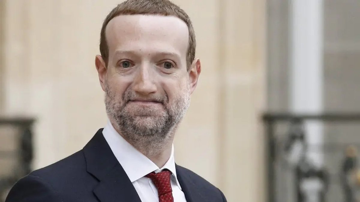 Mark Zuckerberg with the jaw of Mark Chapman .