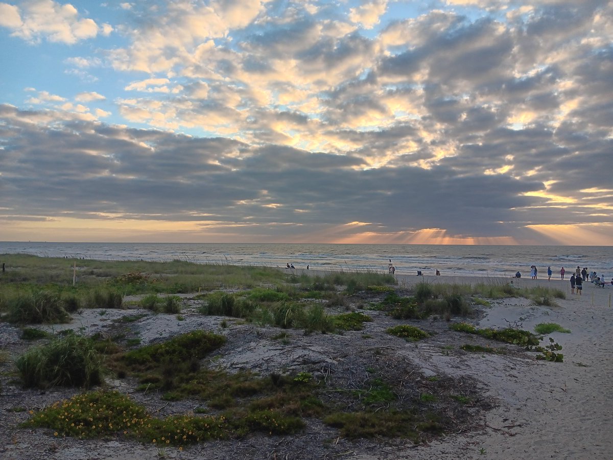 I was bit late and forgot my camera but I got a shot of an overcast sunrise.

Happy Easter!