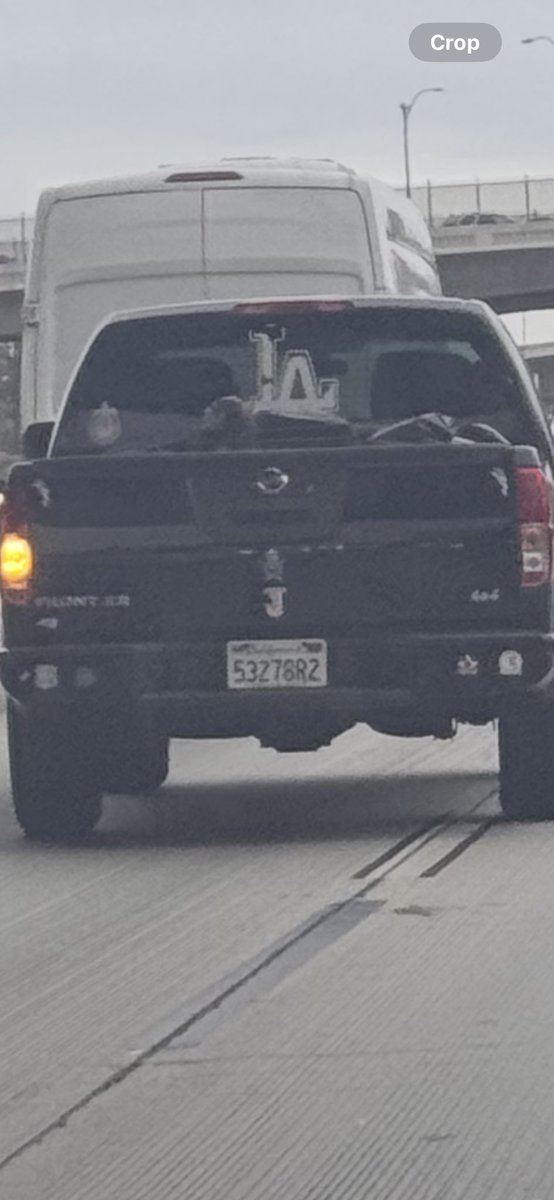 zelnayel's tweet photo. Disgusted by this Nissan Frontier driving on the I-5S through Anaheim this morning around 7:50 am for animal endangerment. They carried a crate covered in plastic and a puppy trying to escape. A report filed w/ CHP as I was afraid of puppy jumping on the freeway https://t.co/fOAM9cEn35