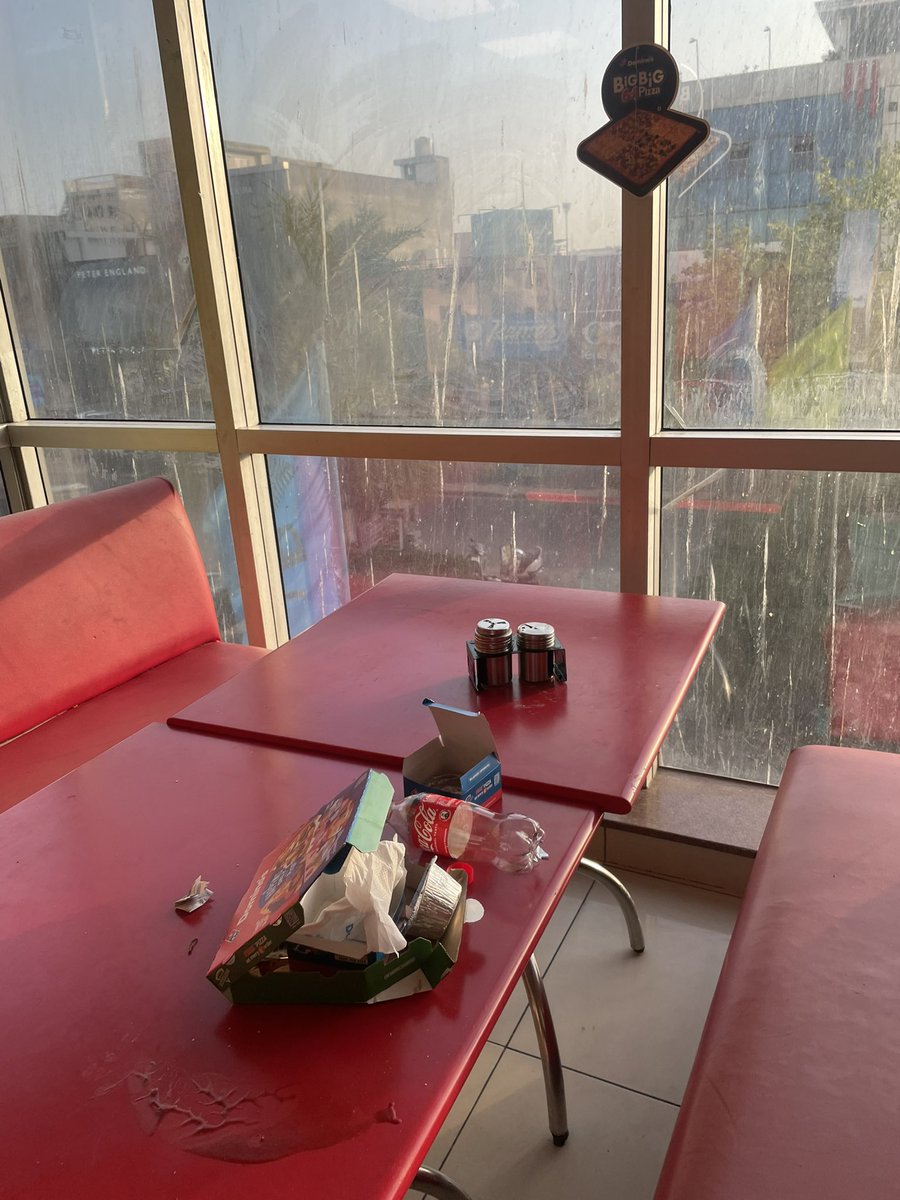 lisn10guy's tweet photo. Pathetic state @dominos_india — dirty tables, clueless staff, zero interest in customer service. Walked into a mess, not a restaurant. #DominosMansarovar https://t.co/K6vQU3olKx