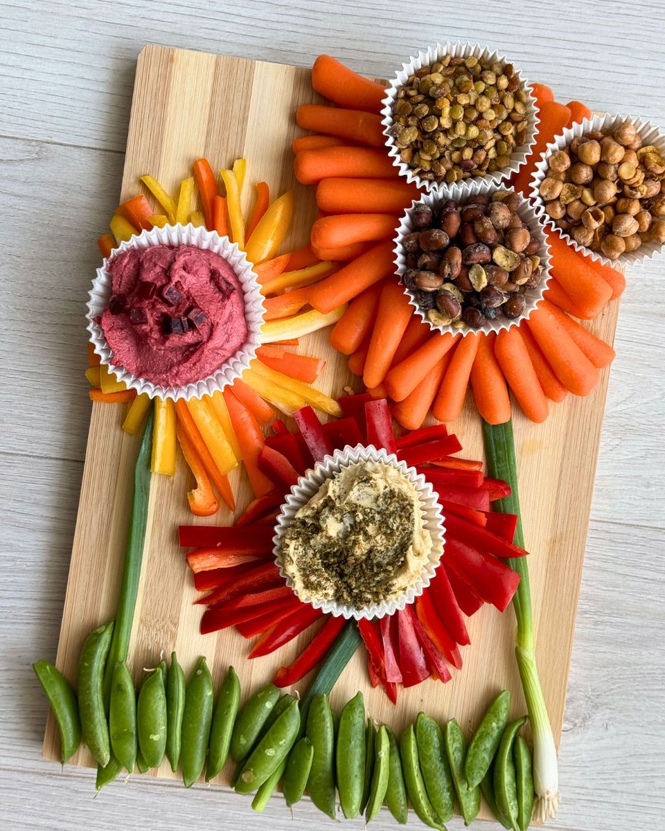 🌸 A snack board in full bloom 🌸

This Easter, we’re getting creative with our veggies and our roasted snacks: 

🥕 Roasted chickpeas, lentils &amp; favas
🌶️ Fresh-cut veggies
🌿 Hummus for dipping
🐣 All dressed up for spring

Happy Easter from our family to yours! 💚