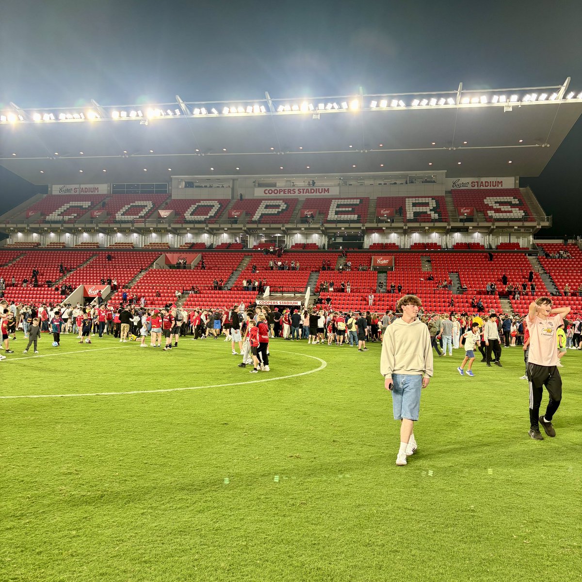 Domjack8's tweet image. Terrible quality but can never beat a last minute winner

Great setup in the ground for Adelaide and let people on the pitch after. Over 11,000 people in for a 3-2 win!