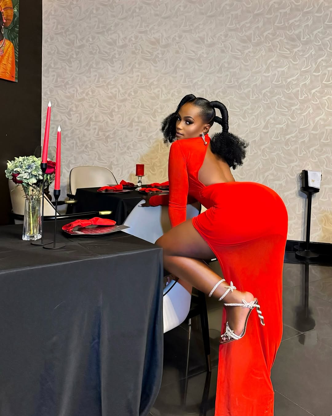 Gloria Bugie poses boldly on social media