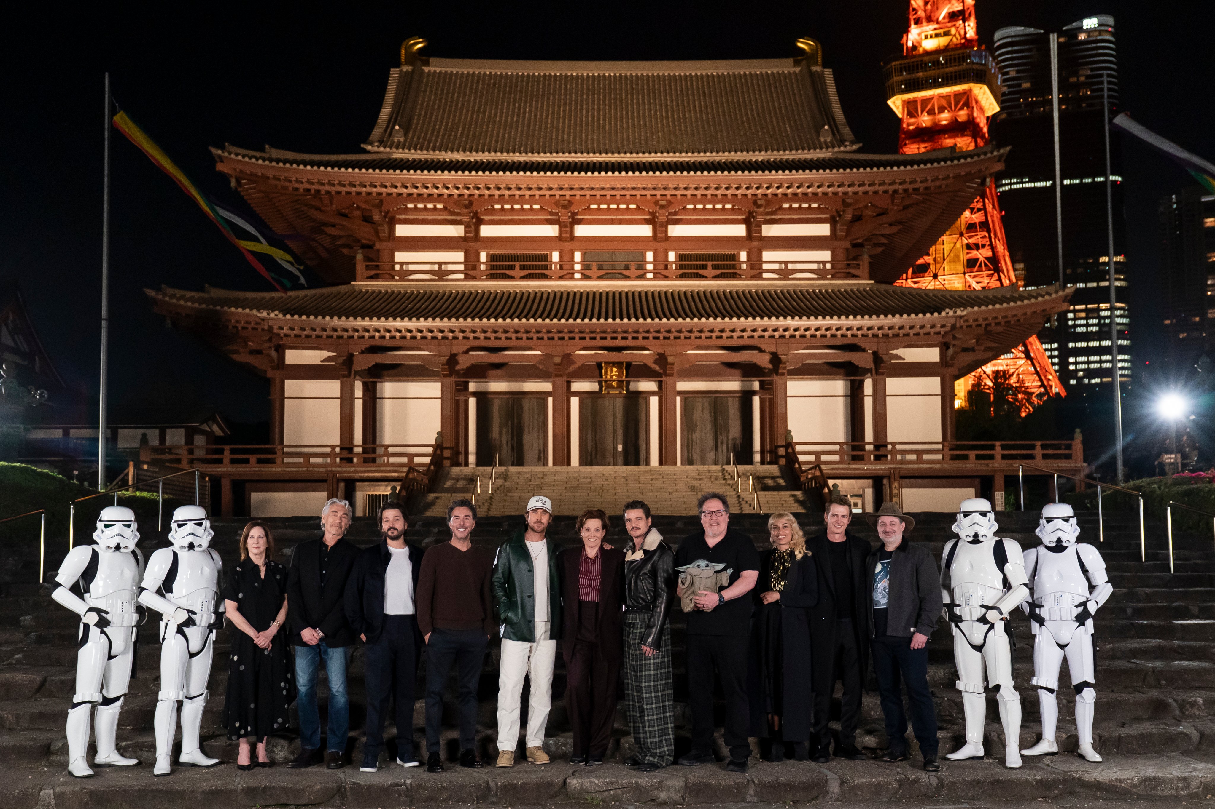 Filmmakers and Star Wars cast stand in front of the Zojoji Template in Tokyo