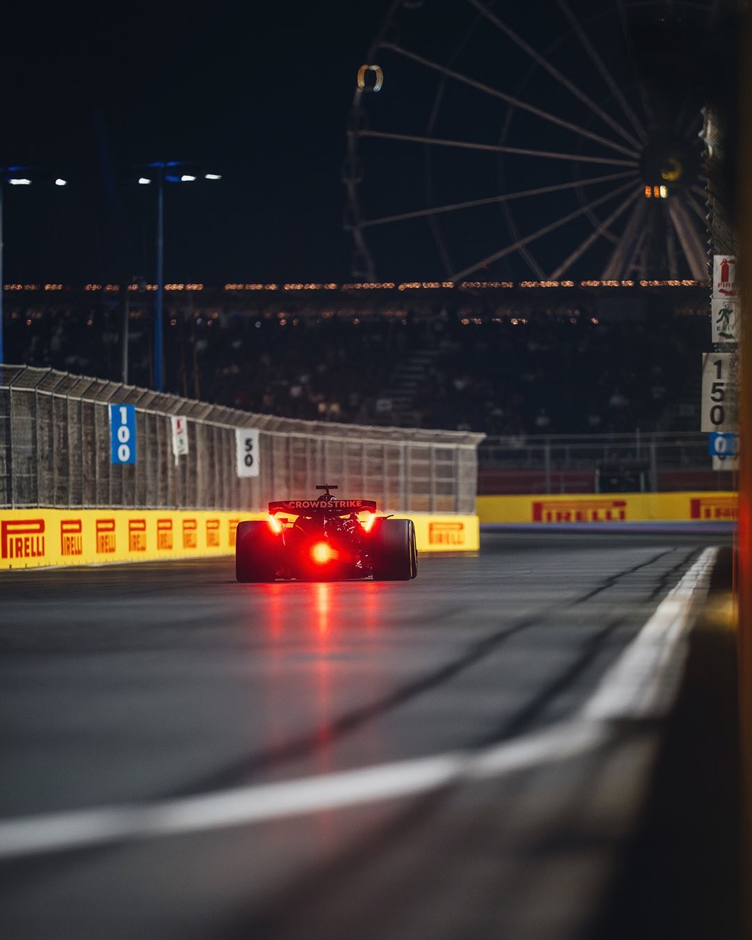 The read end of the Mercedes W16 going down a straight at Jeddah Corniche Circuit