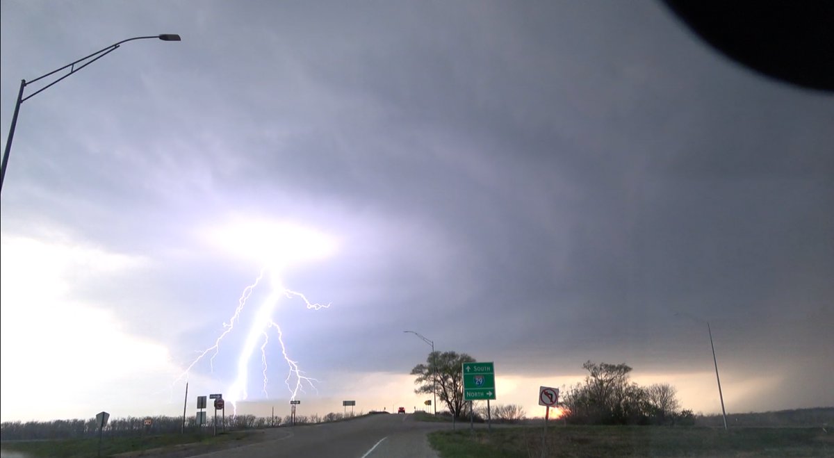 MyRadarWX's tweet photo. Yikes! Meteorologist @MatthewCappucci snagged this shot of incredible lightning shooting out of the clear-air updraft of a supercell thunderstorm near Tabor, Iowa minutes before it produced a destructive tornado. https://t.co/Wk6NSxE30O