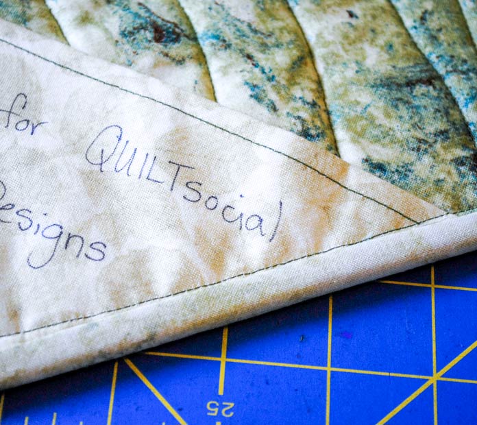 QUILTsocial's tweet photo. Learn 7 essential steps to take after trimming your quilt, including adding binding, labels, and creating quilt sandwiches. Plus, discover must-have quilting products for the job! 🧵✨ #QuiltFinish #QuiltTips #ScrappyQuilt #BindingTips #QuiltTutorials https://t.co/T4M39FLokB https://t.co/QTj50BPDFu
