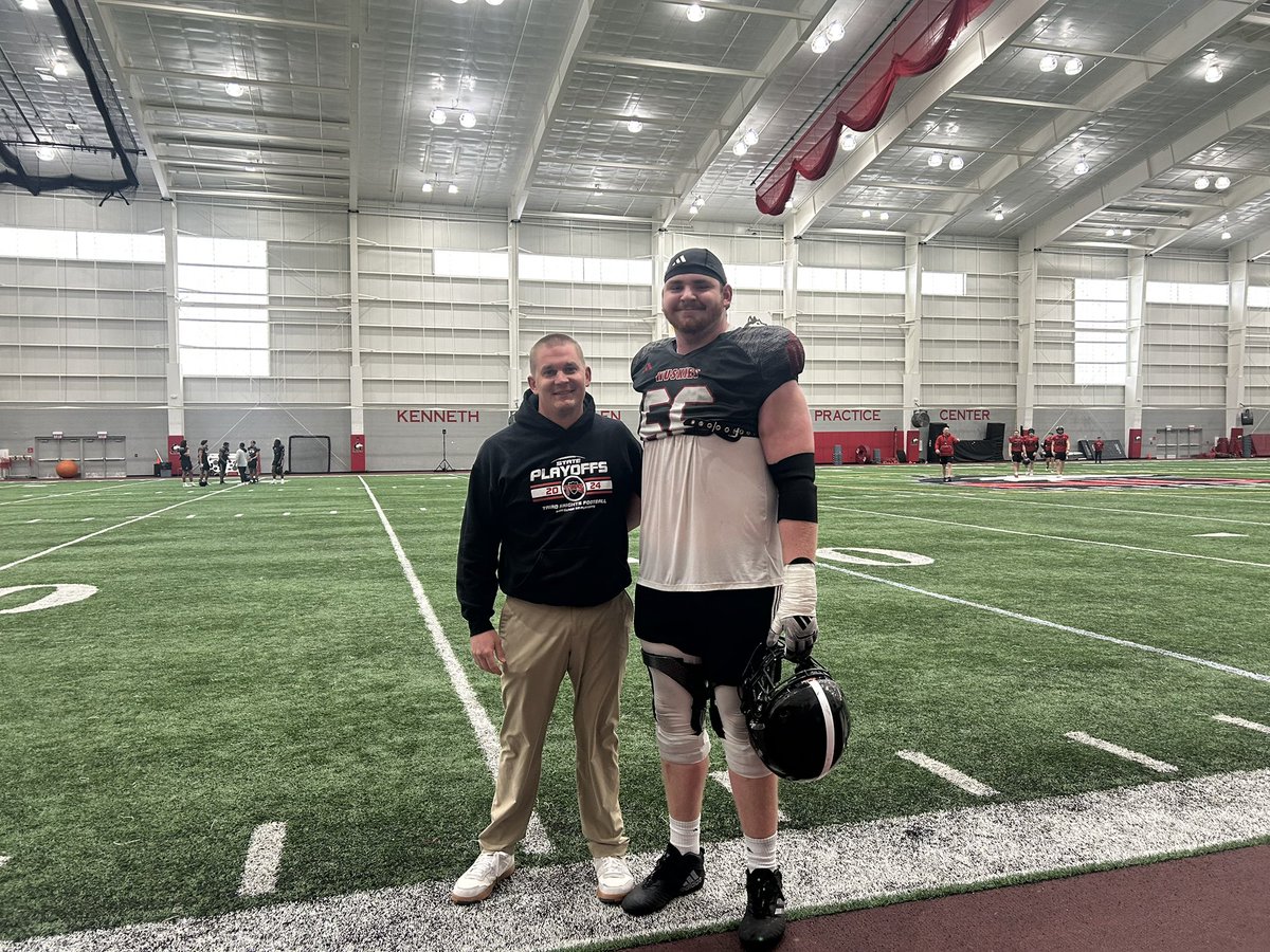 triadknights_fb's tweet photo. Once a Knight always a Knight!  @LaneMahnesmith_ putting in work for @NIU_Football. Thanks @NIUCoachHammock for allow me to stop by and watch practice. https://t.co/mEwDjflA8z