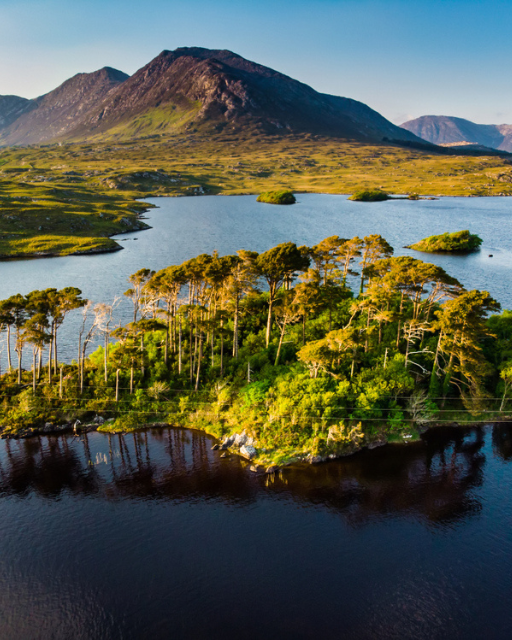 LoveIreland3's tweet photo. Aerial view of Twelve Pines Island, standing on a gorgeous background formed by the sharp peaks of a mountain range called Twelve Pins or Twelve Bens, Connemara, County Galway, Ireland. https://t.co/Zm2MH5jSxV