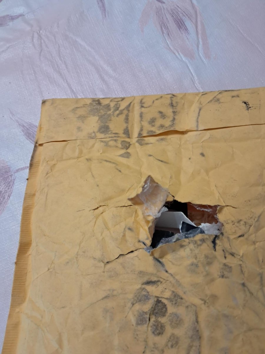 IllustriousMC3's tweet photo. @FedEx care to explain why my package came like this? You should pay for it. Looks like someone tried to steal it then ran it over or stomped on it to break it. https://t.co/26Zr4GMklb