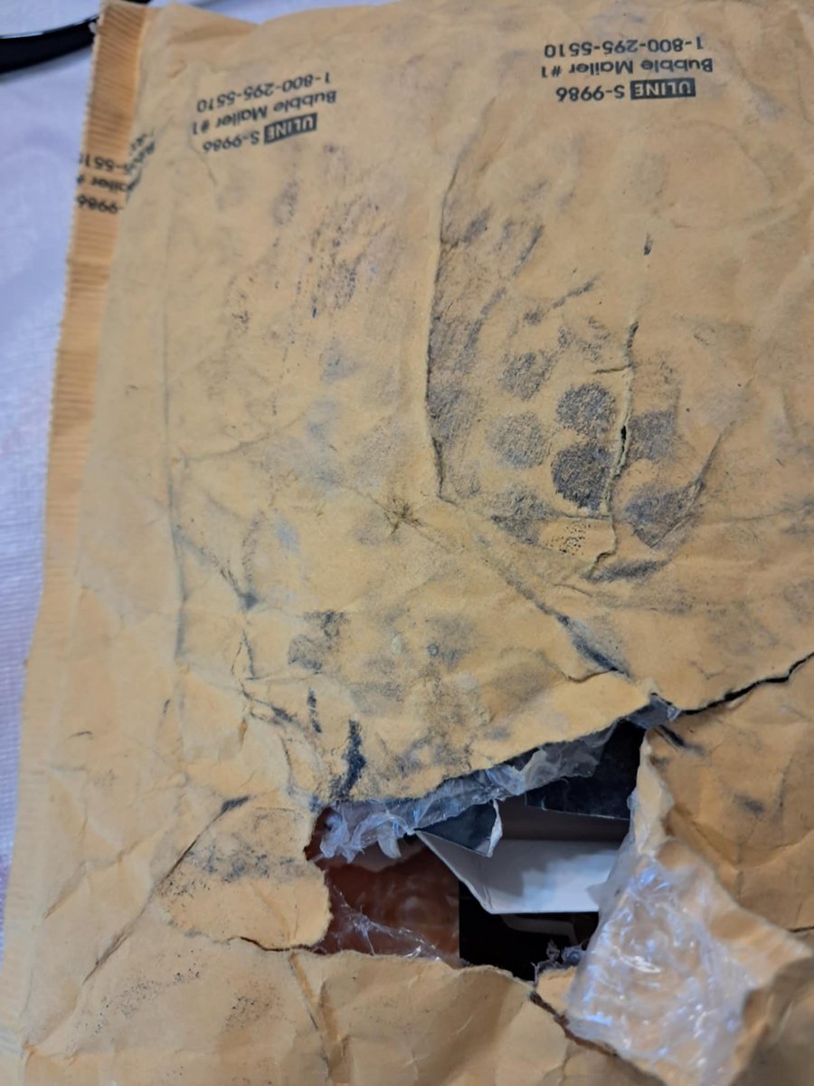 IllustriousMC3's tweet photo. @FedEx care to explain why my package came like this? You should pay for it. Looks like someone tried to steal it then ran it over or stomped on it to break it. https://t.co/26Zr4GMklb