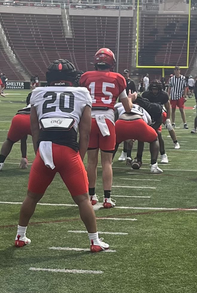 Great picture of Jeremiah Kelly at Center blocking for RB Jakorion Caffey at UC practice today! Proud of these two young men. #OnceAnEagle…
