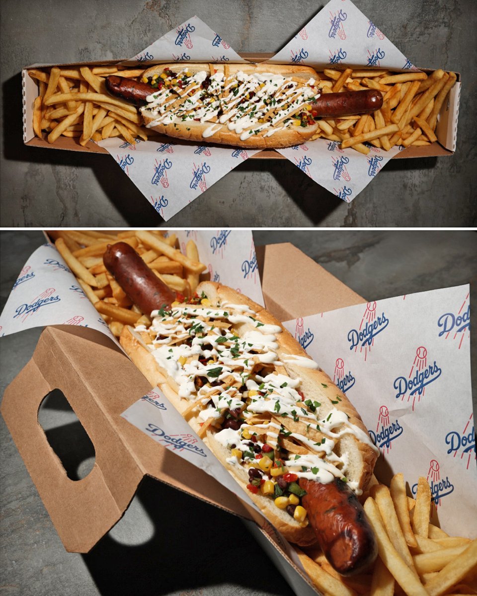 The Dodgers will have a massive 16-inch hot dog at home games this year 👀

The Slugger is made with a jalapeño cheddar sausage, white cheese sauce, corn relish, cilantro crema, tortilla strips and comes with French fries

Who could eat all of this? 🌭