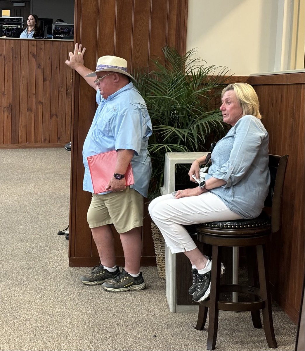Eddie and Angela Woods watch their final horse sell at OBS. Twirling Candy colt brings $560k.