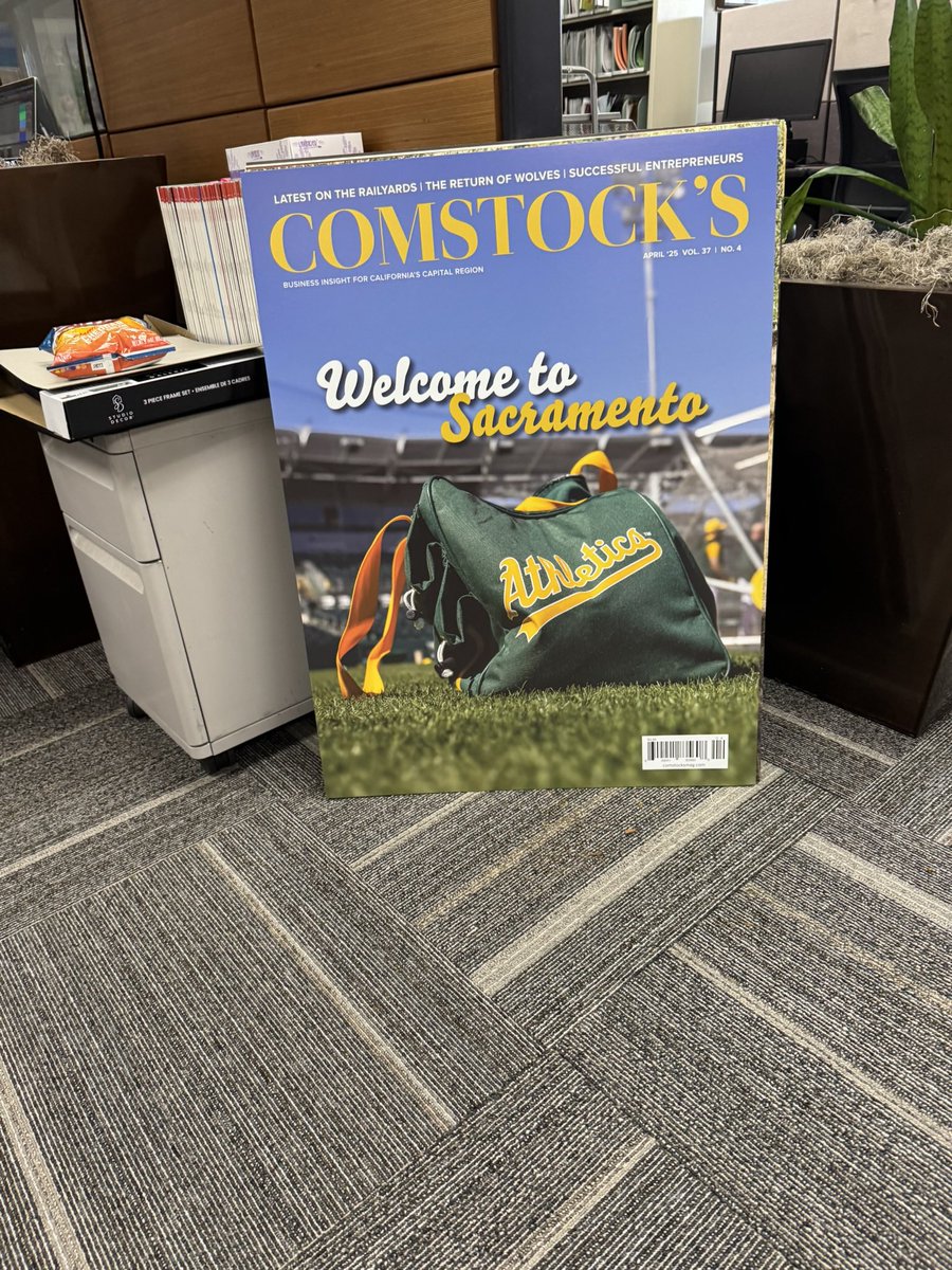 Visited the Comstock’s office on Wednesday to record a podcast and caught the poster blowup of my April cover. It was quite the thrill! <a href="/comstocksmag/">Comstock's magazine</a>