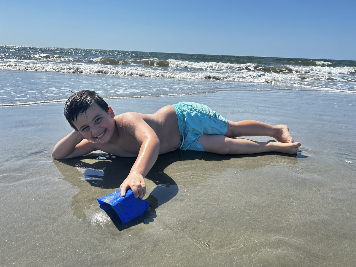 They love the beach!

(Brady posed like that by himself and then Alisha went and got her phone to take a picture)