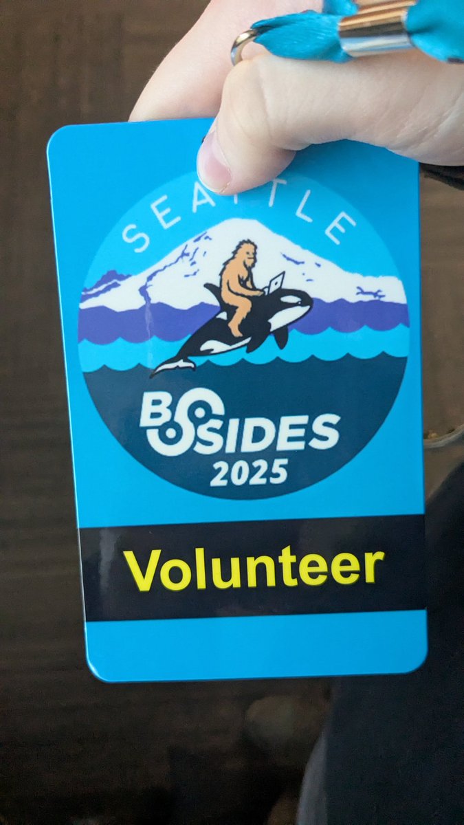 llie087's tweet photo. Accidentally got given a BSides Seattle volunteer badge, trust no one of lmao #BSidesSeattle #bsides https://t.co/FLSF47jKId