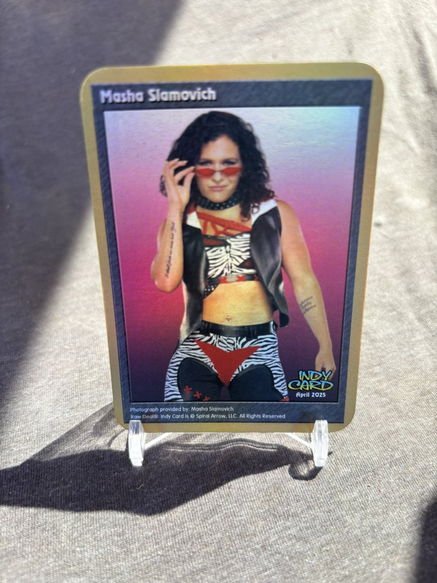Just cause you’re not in Vegas for #WrestleMania41 doesn’t mean you have have some fancy stuff to show off! Add some style to your collection with this Foil Limited Edition <a href="/mashaslamovich/">Masha Slamovich マーシャ・スラモビッチ</a> ! It’s a Mania week exclusive. When it’s gone it’s gone! DM us we got you covered!