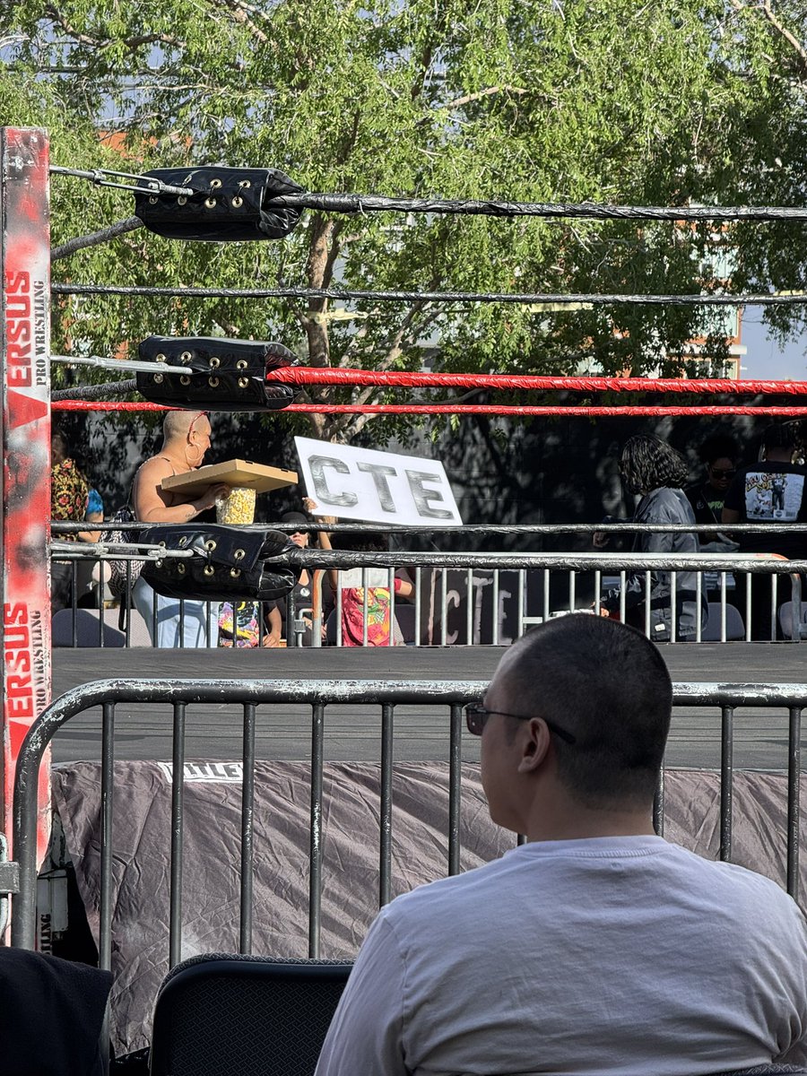 Manic_Monkey83's tweet photo. @wrestlemepod Lads. We’re at a free outdoor show at the Container Park in Old Vegas.

There’s a kid flashing this sign around and I’m not sure whether I’m missing something? https://t.co/wQDjSIJor2