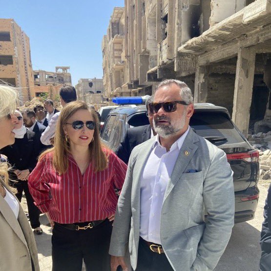 Partisangirl's tweet photo. Zionist @CoryMillsFL parading Ghouta #Syria like a conqueror. Flash back to Ghouta 2013: where kidnapped alawite, men, women, and children were paraded through the streets in cages, under Jolani’s rule. https://t.co/m9lkUyLuJ3