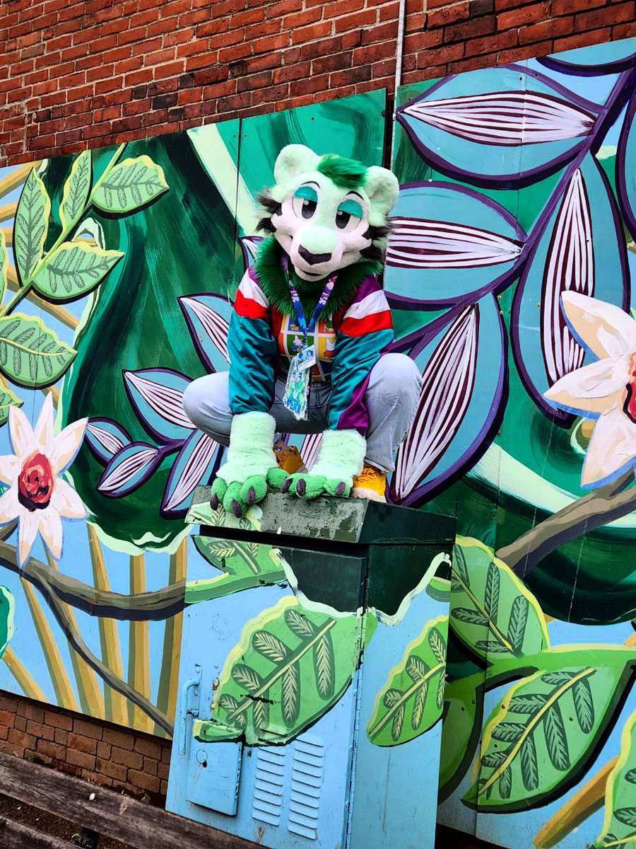 SockCorgi's tweet photo. ✧･ﾟ: *✧ If you saw me, a stranger in the streets, could you tell me you love me? ✧･ﾟ: *✧

Happy #FursuitFriday 🌿 @edgar_undead_ noticed this mural in Portland at #FCL2025 and was kind enough to take photos of Fern in front of it 🌱 https://t.co/THZj3wzMVM