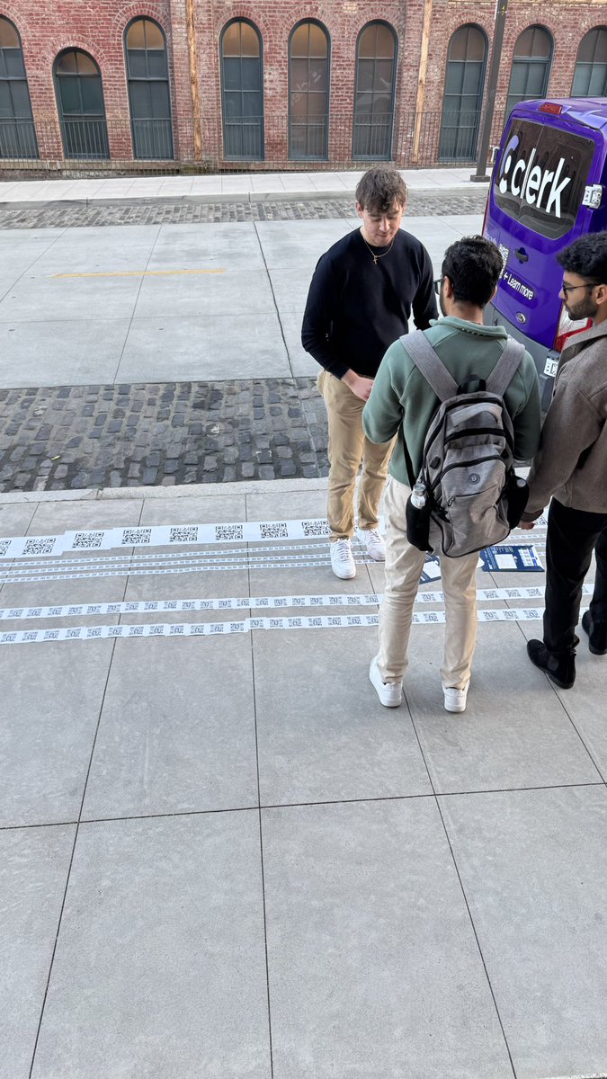 Only in SF: founder pulled up to YC and glued his startup QR code 200 times in front of the door. Pitching to prospective users (YC founders) and YC partners.