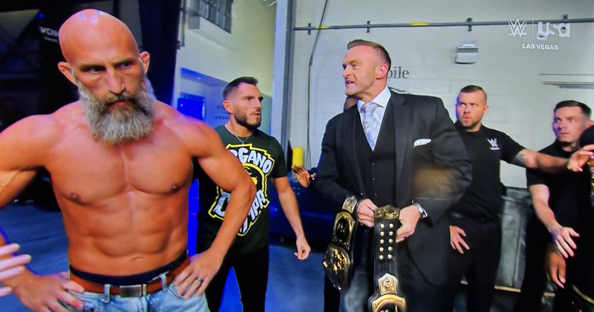 TheSlyHog's tweet photo. @MrSantiZap Nick Aldis had the crowd in his hands and dropped the ball. The groan of the crowd  should have let WWE know.  Saving the TLC for Smackdown and not putting it at Mania is disappointing for everyone. It will still be a banger match, but it should have the biggest stage. https://t.co/8WVSXSgJX9