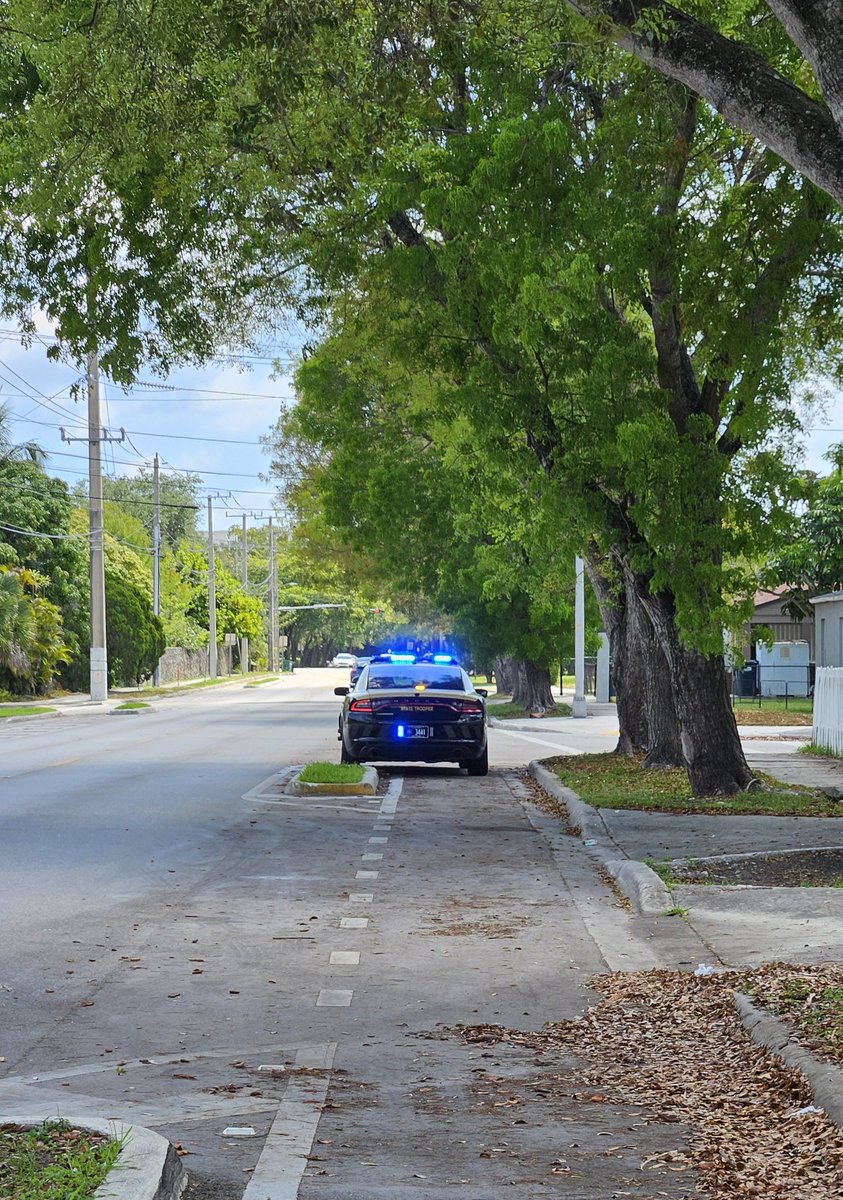 Hey, state trooper with plate 3441, that's a Bike Lane, created at [modest] public expense for safety. Block part of one of those <a href="/GoMiamiDade/">Miami-Dade DTPW</a> super-wide car lanes instead. You are focused on car traffic flow, not safety.  C'mon.