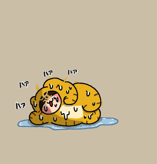 散々舐められたあと何とか口から脱出したトラちゃん 