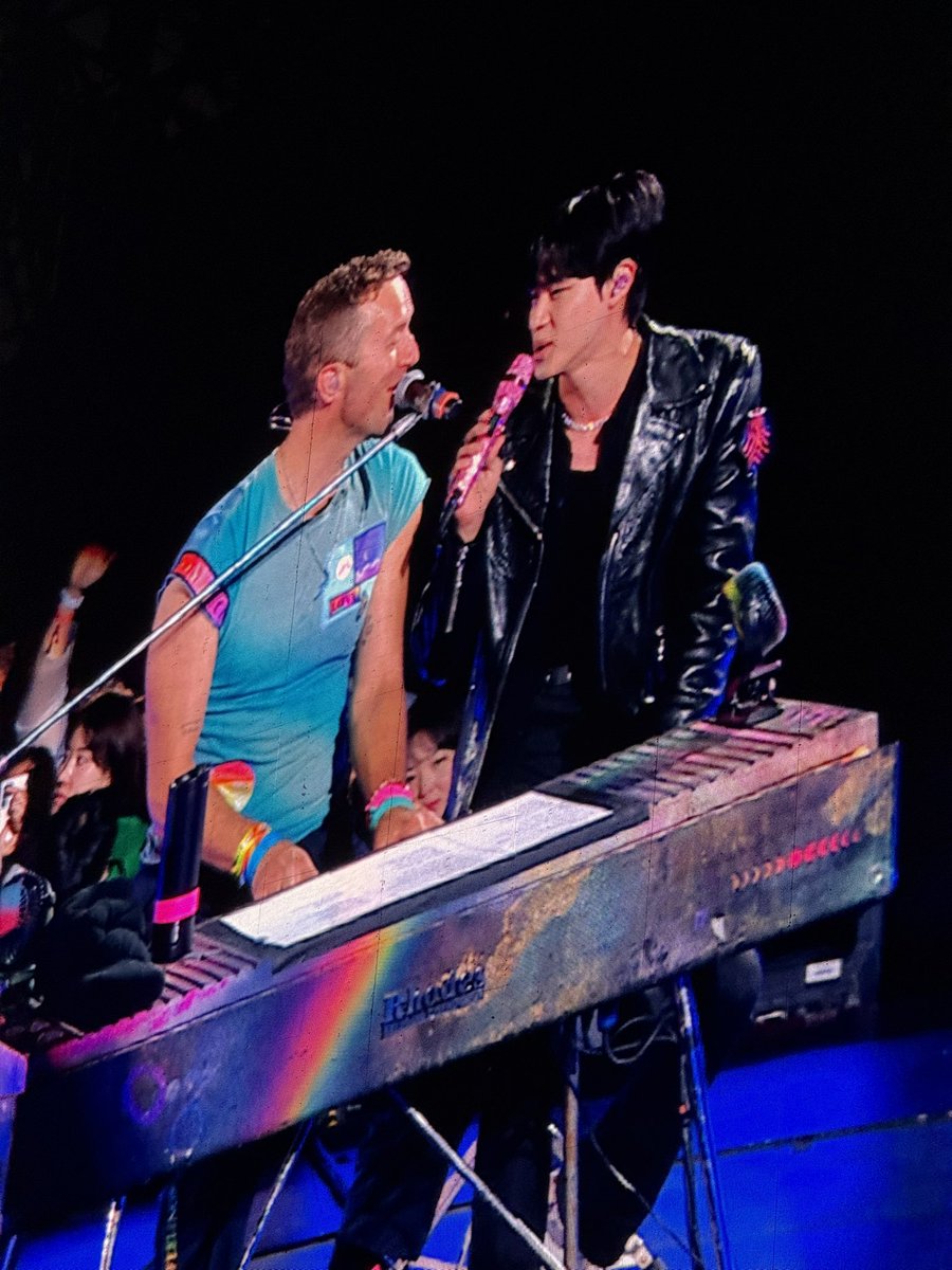 Chris and Jin during Songbook while performing The Astronaut #ColdplaySeoul