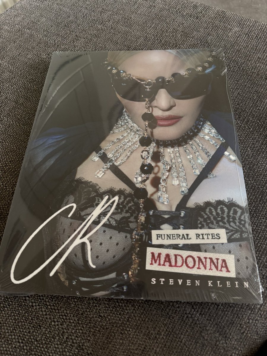 D_Roosh's tweet image. Ooh it’s arrived I kinda want to keep it sealed but can’t resist it #InsideMadonna #Madonna #StevenKlein #FuneralRites #MadonnaFans