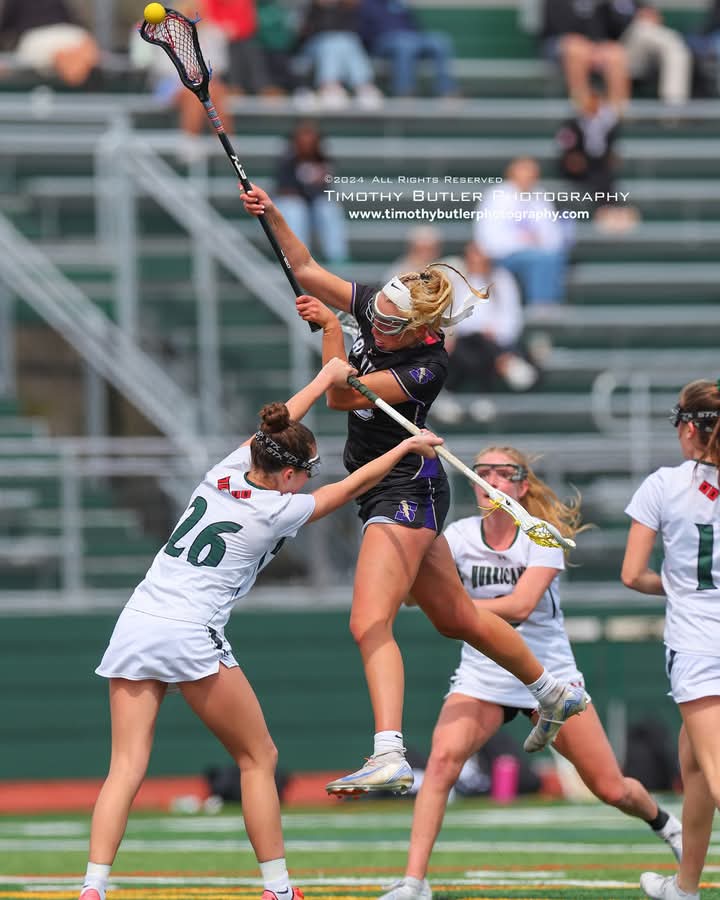 Sophia Buffardi gets some air as she shoots and scores in a 12-8 win over Westhampton Beach earlier today.