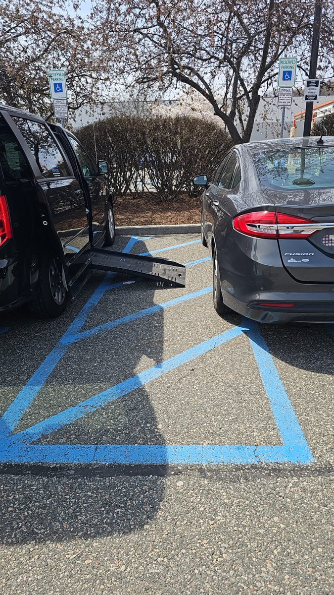 CheriannM's tweet photo. Don’t be this person. They did have a handicap sign but still. You see a van next to you. You see those line? They are so we have room to get onto the ramp. We had to back out to get Mikey in. I wanted to slam his chair into the car but I didn’t. People don’t pay attention. https://t.co/NjF57DhUxq